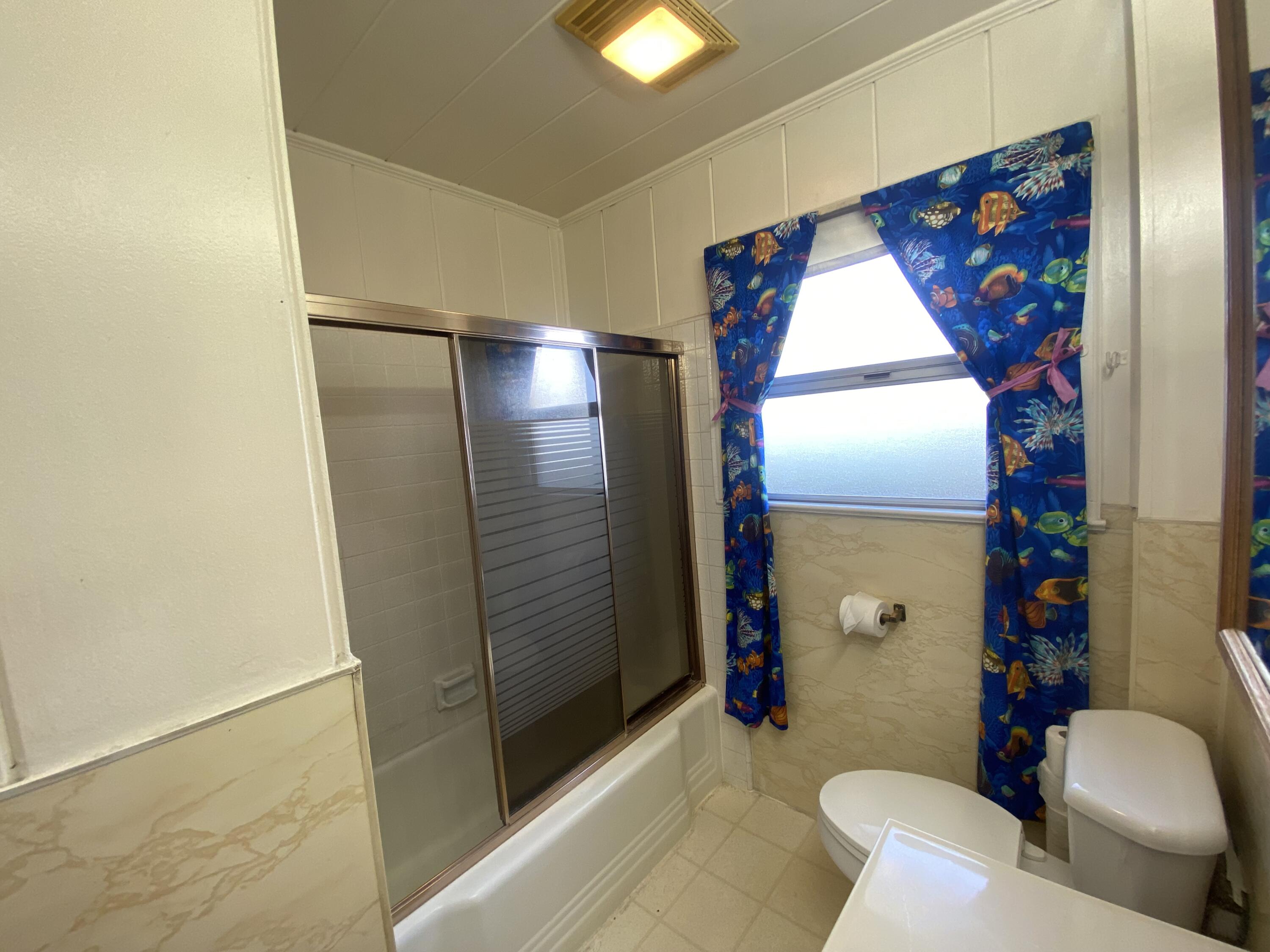 230 Myrtle Street Chester, CA 96020 - Photo 29 of 46 a bathroom with a toilet and a shower