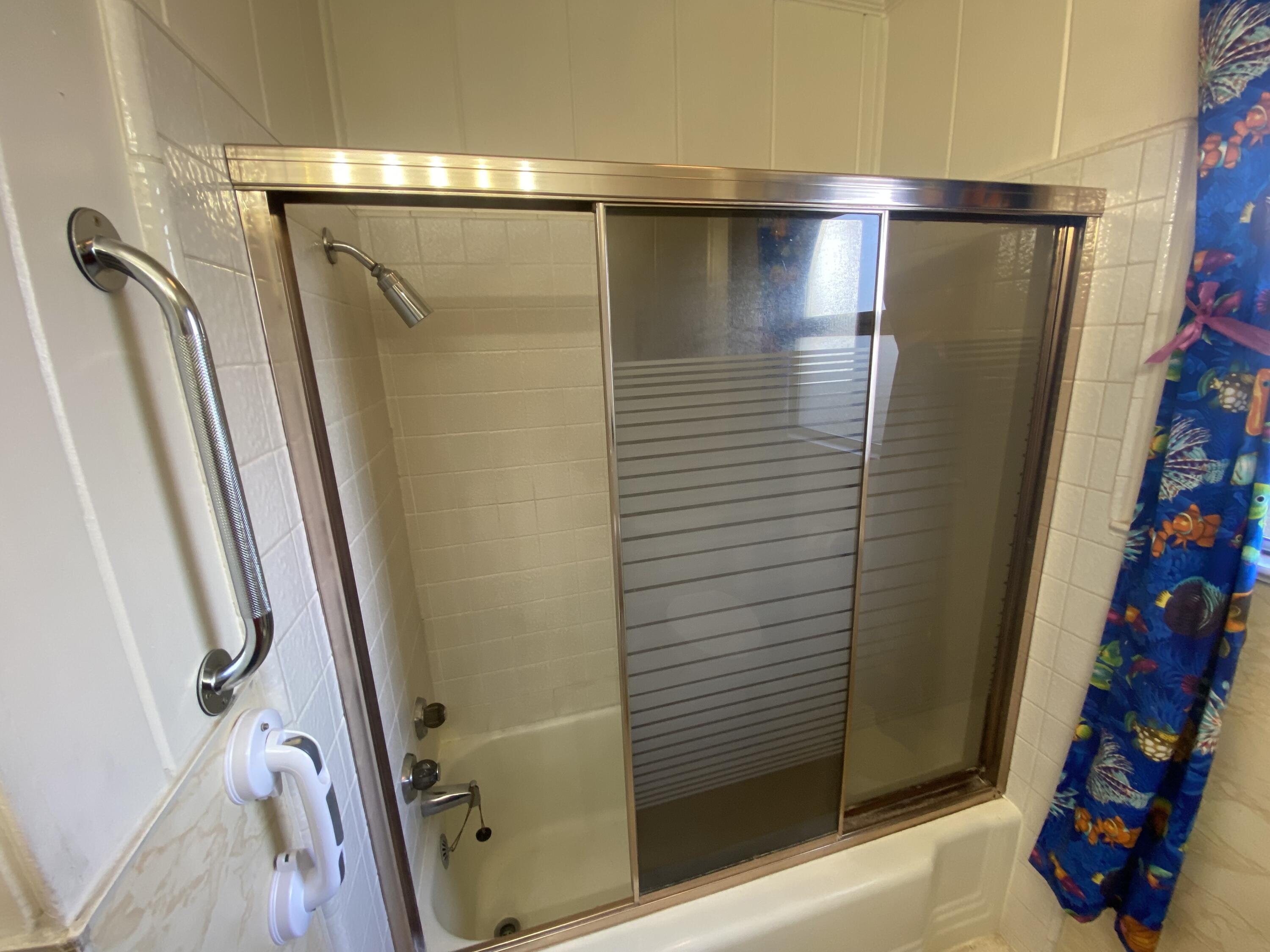 230 Myrtle Street Chester, CA 96020 - Photo 32 of 46 a bathroom with a shower and a tub