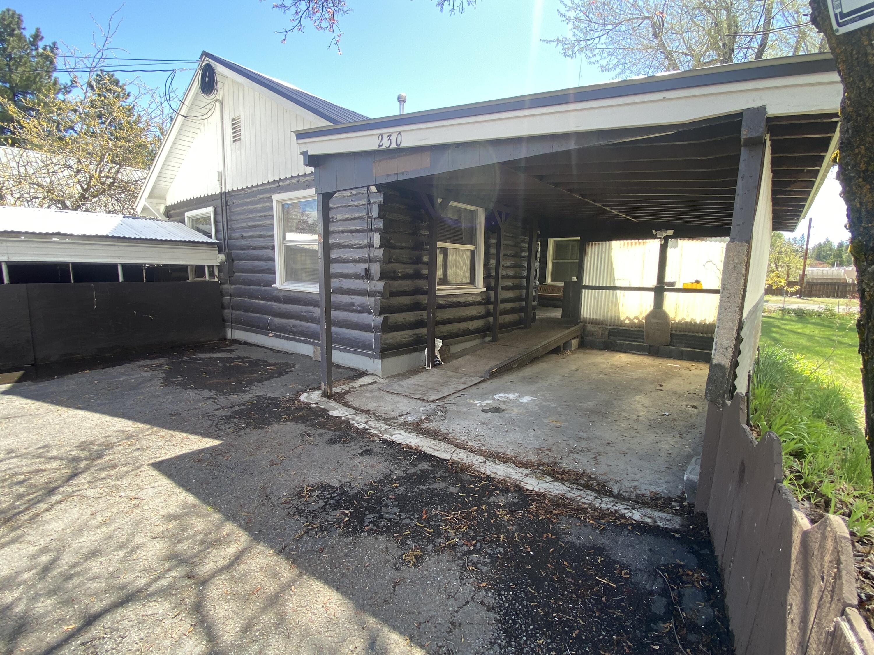 230 Myrtle Street Chester, CA 96020 - Photo 4 of 46 Carport view to house