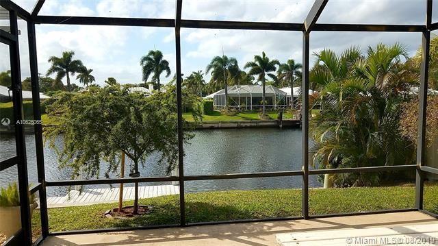 861 Camino Gardens Lane Boca Raton, FL 33432 - Photo 1 of 37 a view of swimming pool from a balcony