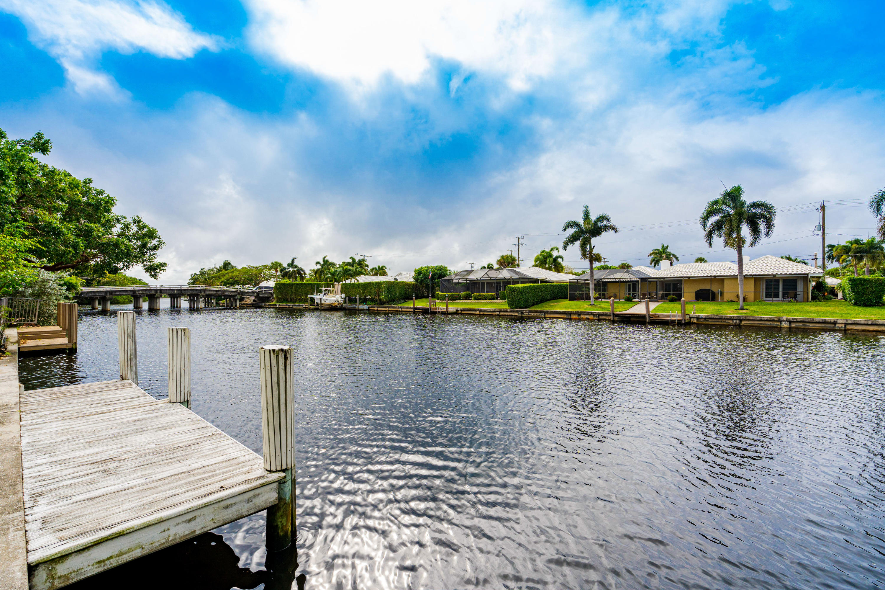 861 Camino Gardens Lane Boca Raton, FL 33432 - Photo 33 of 37 a view of a lake with houses