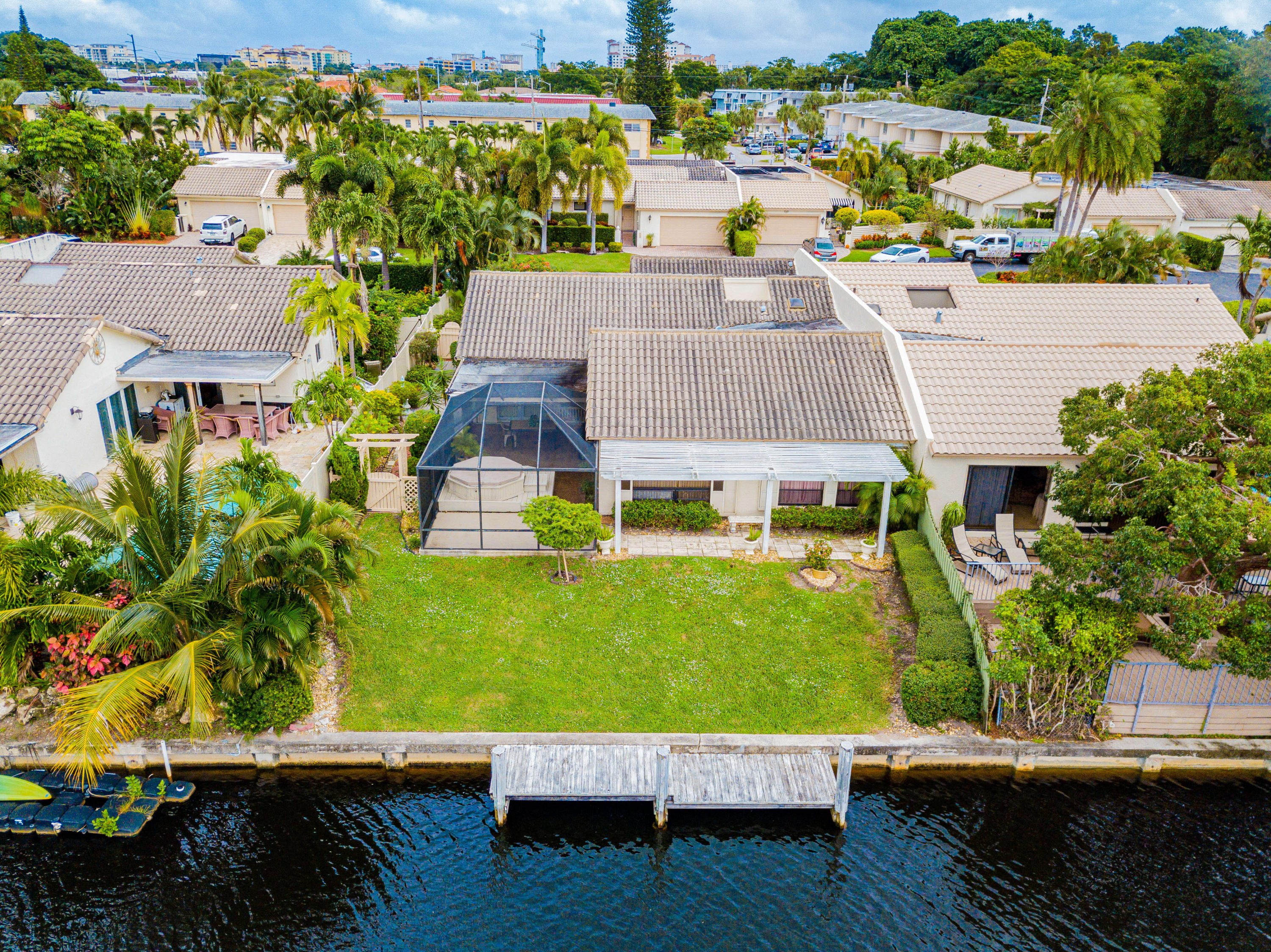 861 Camino Gardens Lane Boca Raton, FL 33432 - Photo 4 of 37 an aerial view of a house with garden space and street view
