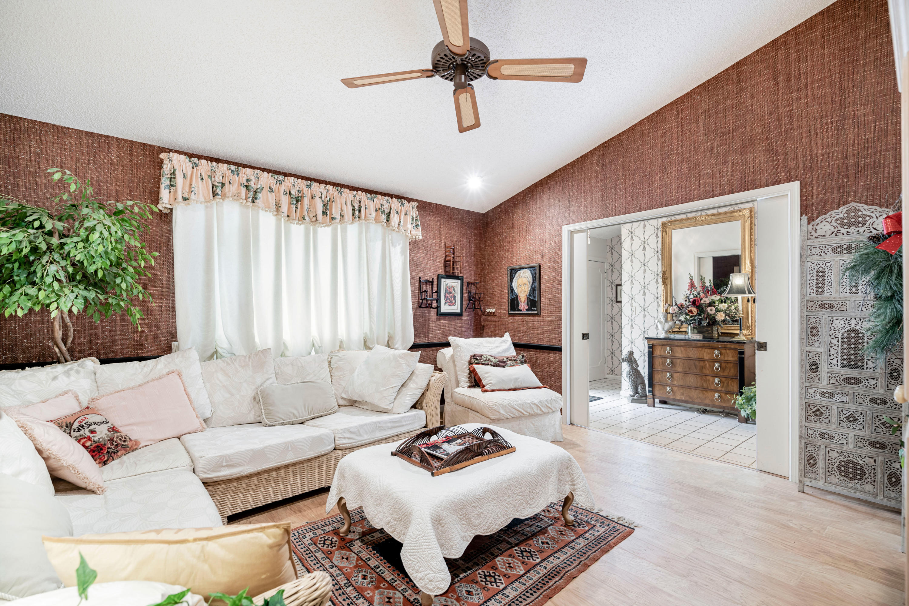 861 Camino Gardens Lane Boca Raton, FL 33432 - Photo 8 of 37 a living room with furniture and a large window