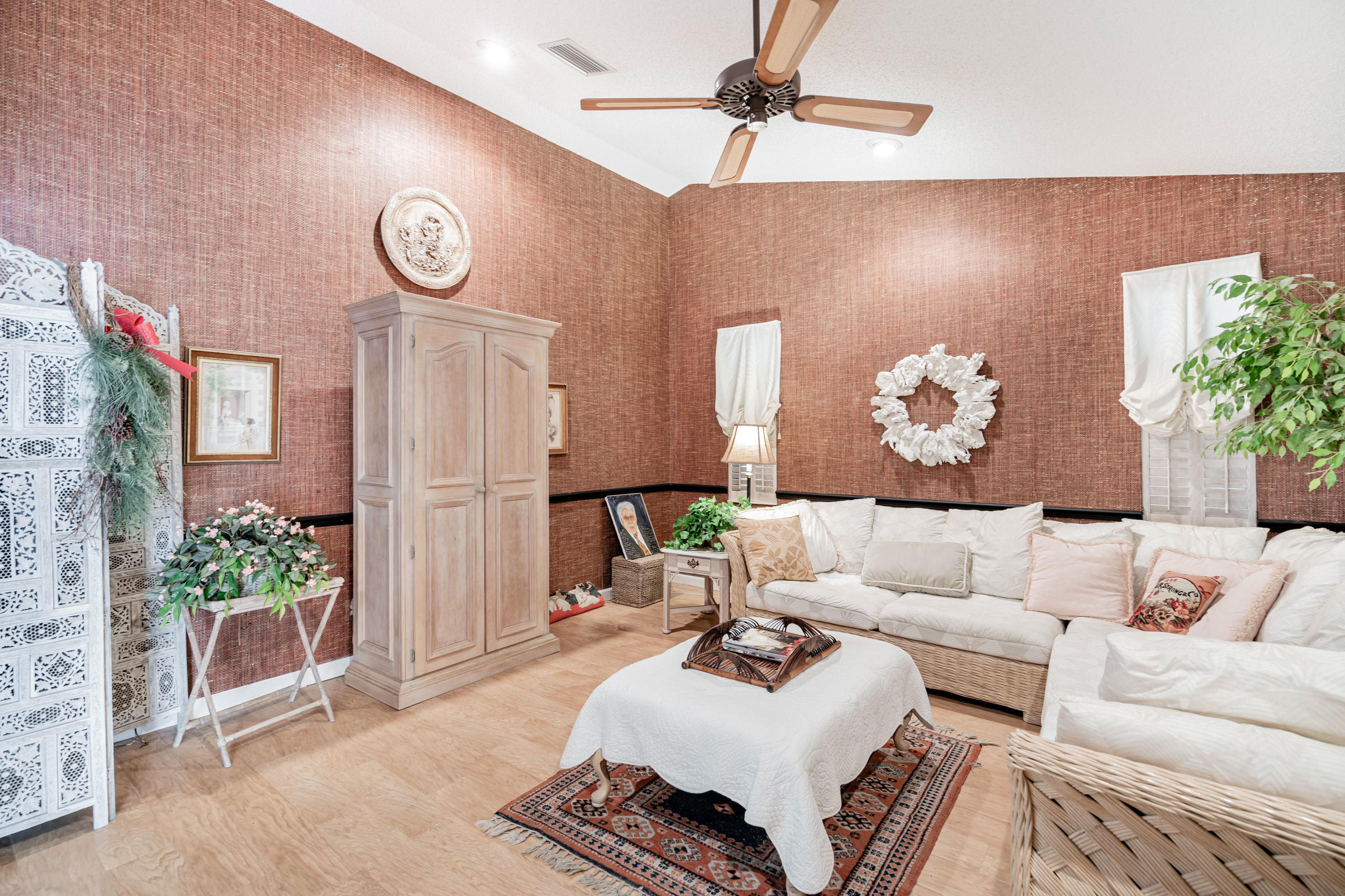 861 Camino Gardens Lane Boca Raton, FL 33432 - Photo 9 of 37 a living room with furniture and a clock