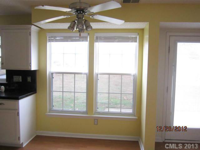 1901 Pine Mountain Road Charlotte, NC 28214 - Photo 6 of 10 a view of an empty room with a window