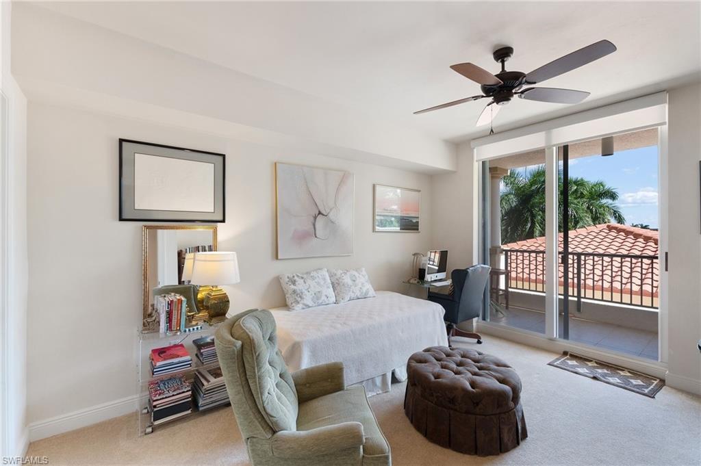 1065 Borghese Lane, Unit 203 Naples, FL 34114 - Photo 9 of 24 a bedroom with a bed and a window