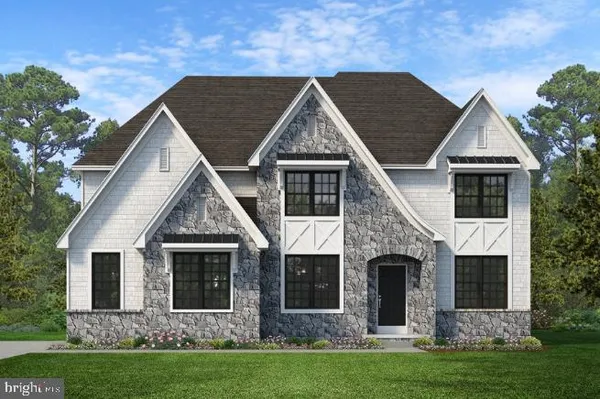 a view of house with yard