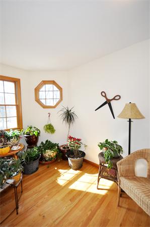 120 Stow Road Boxborough, MA 01719 - Photo 17 of 30 a living room with furniture and flowers