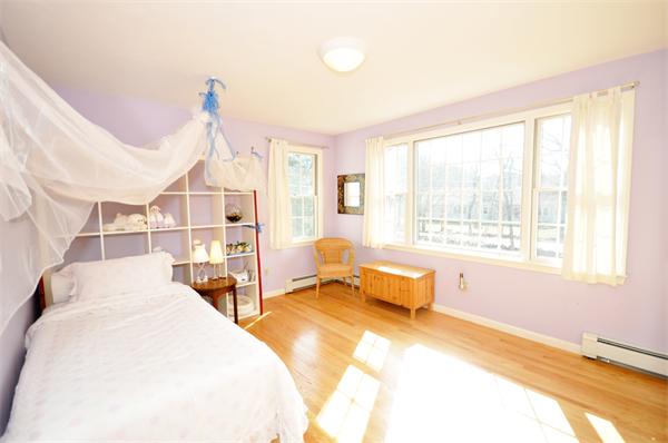 120 Stow Road Boxborough, MA 01719 - Photo 20 of 30 a bedroom with a bed and a window