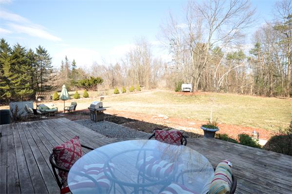 120 Stow Road Boxborough, MA 01719 - Photo 25 of 30 a view of a yard with an ocean view