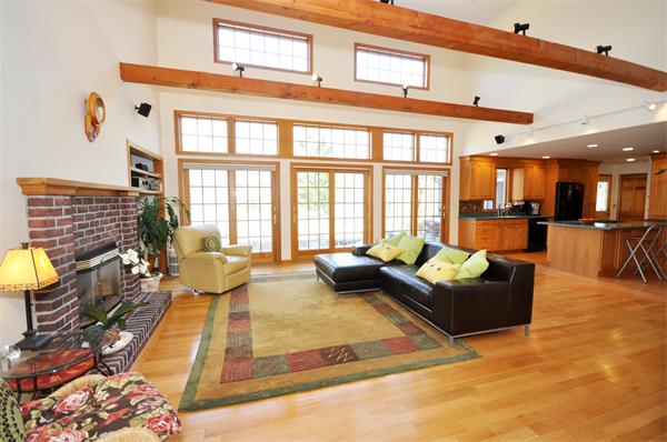 120 Stow Road Boxborough, MA 01719 - Photo 4 of 30 a living room with furniture and floor to ceiling windows