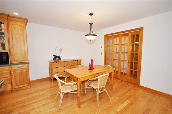 120 Stow Road Boxborough, MA 01719 - Photo 8 of 30 a dining room with furniture window wooden floor