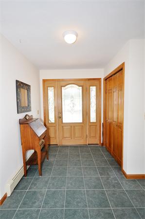 120 Stow Road Boxborough, MA 01719 - Photo 9 of 30 a room with gym equipment and a large window