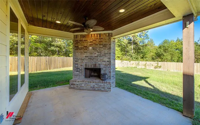a view of a porch and garden