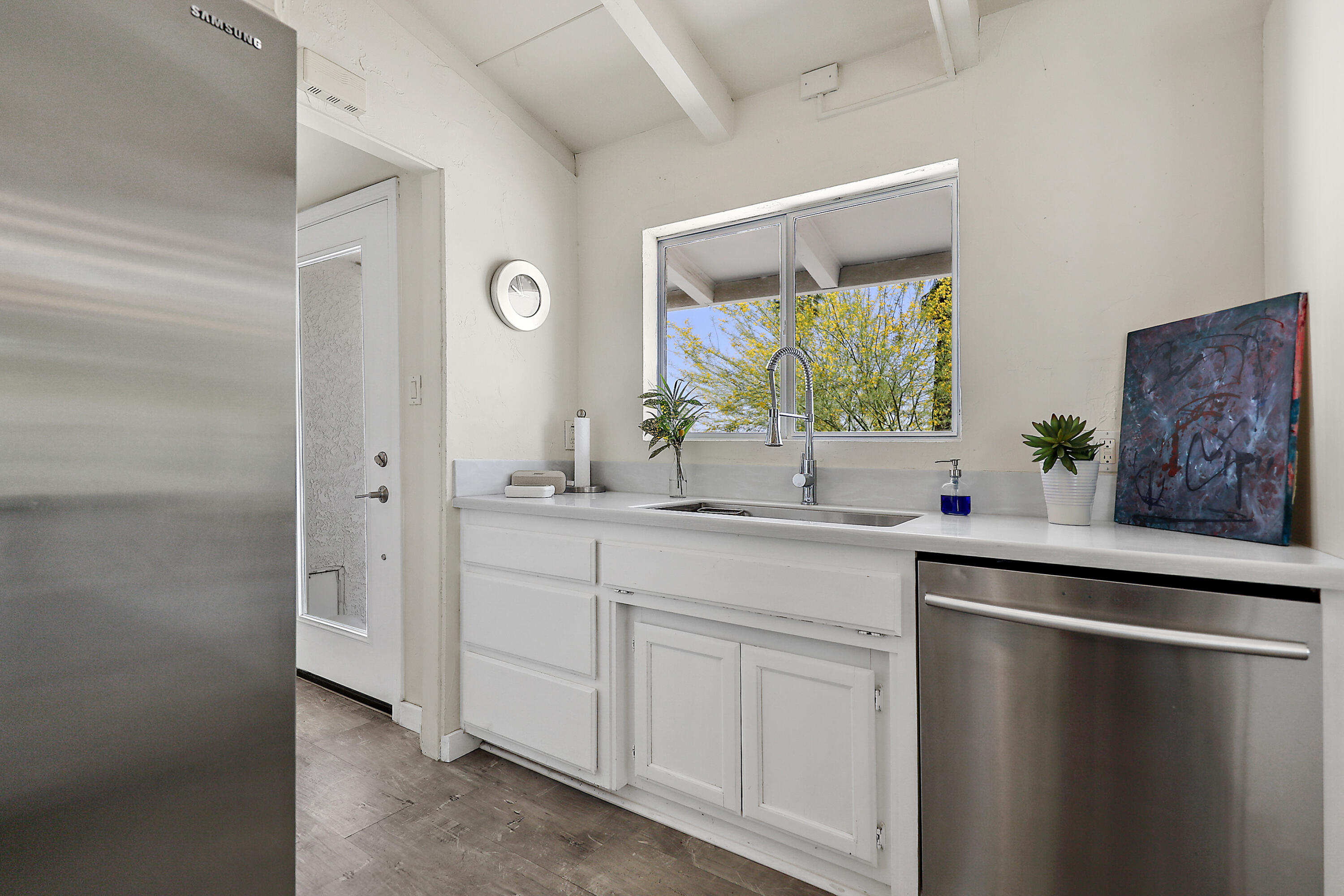 71767 Tunis Road Rancho Mirage, CA 92270 - Photo 11 of 30 a bathroom with a double vanity sink and mirror