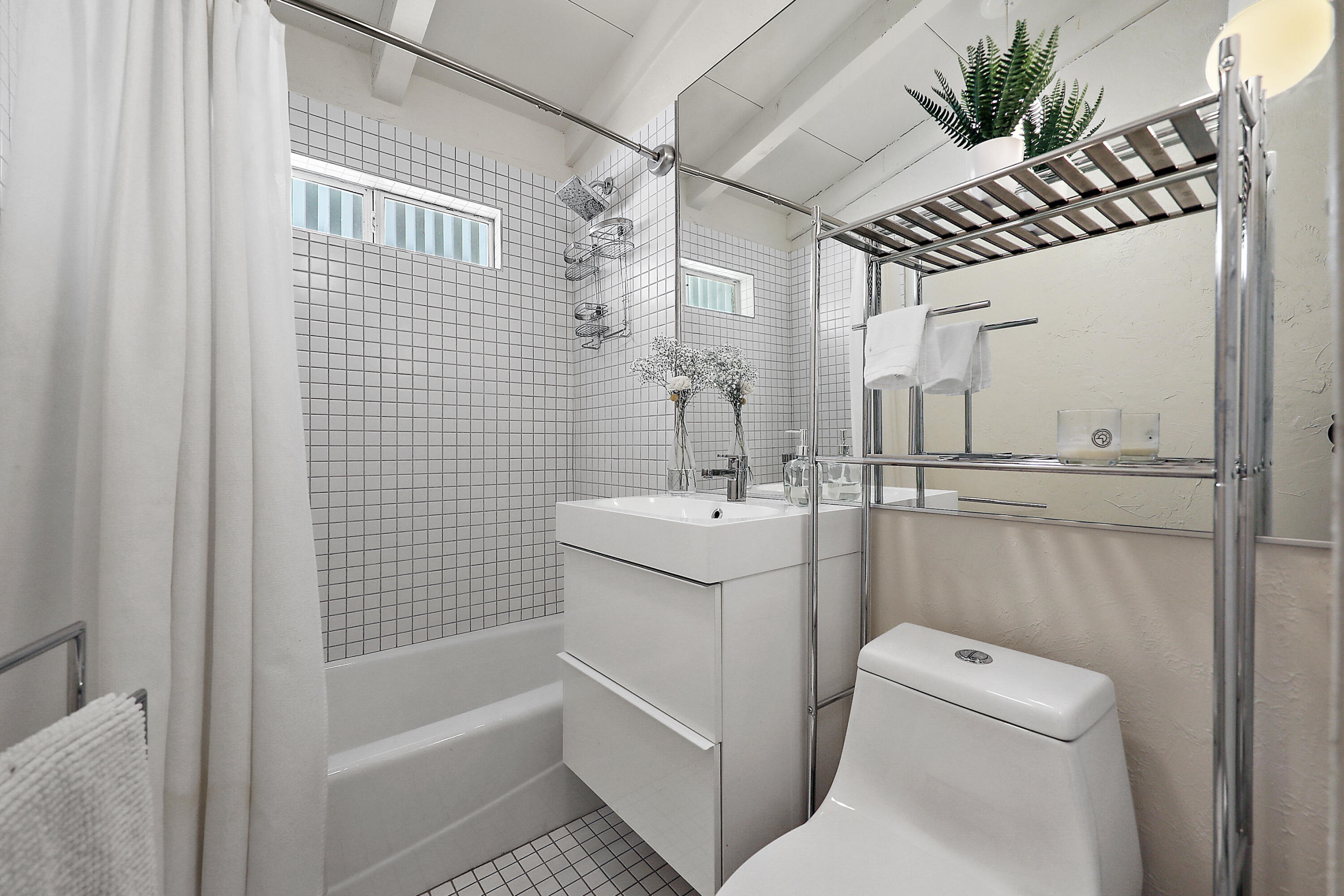 71767 Tunis Road Rancho Mirage, CA 92270 - Photo 12 of 30 a bathroom with a sink a toilet and shower