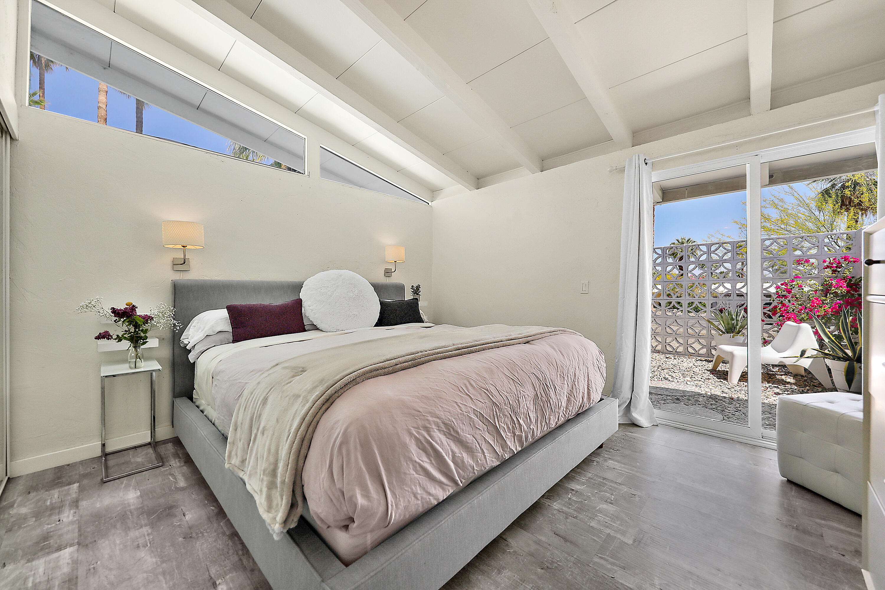 71767 Tunis Road Rancho Mirage, CA 92270 - Photo 14 of 30 a bedroom with a bed and a window
