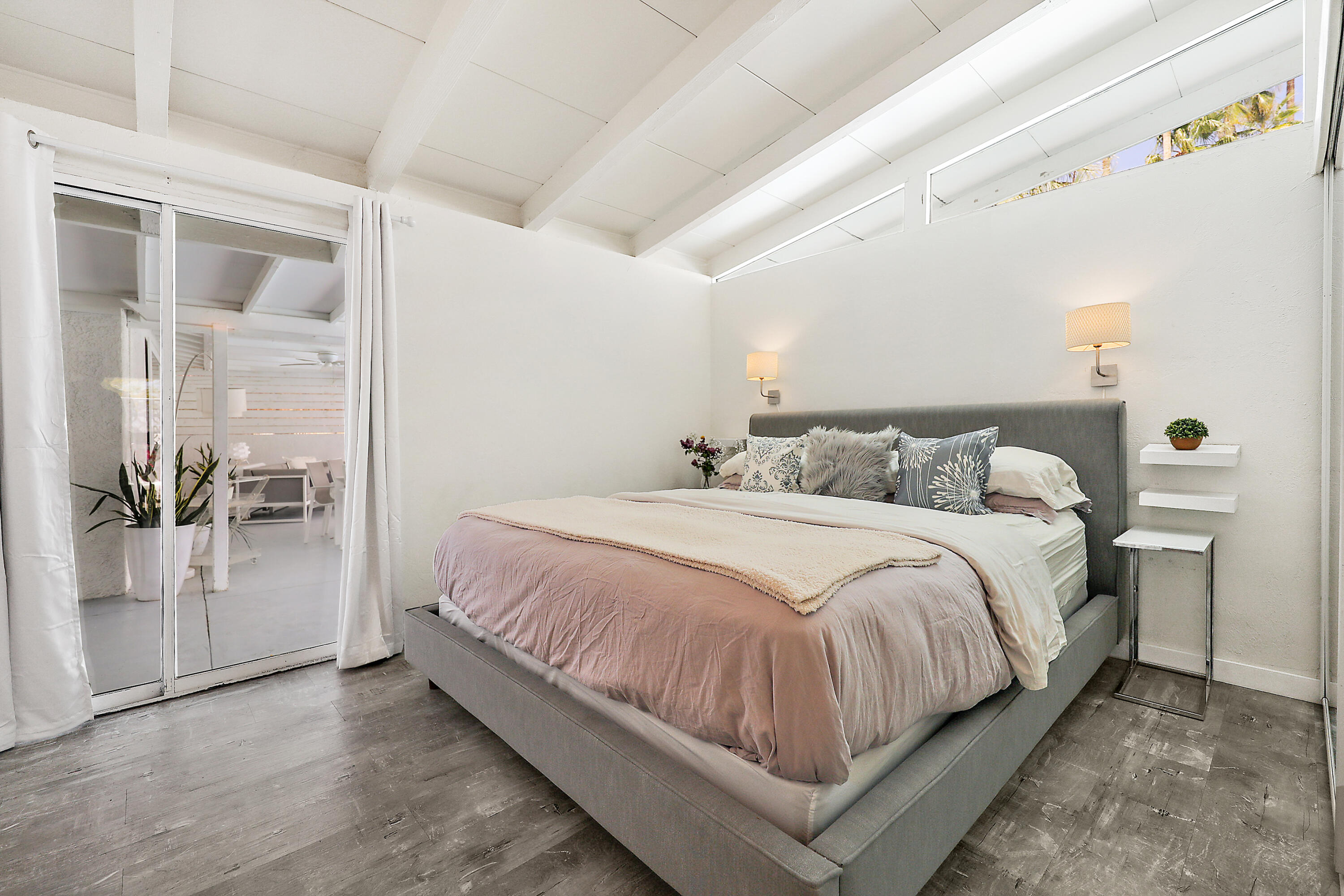 71767 Tunis Road Rancho Mirage, CA 92270 - Photo 17 of 30 a bedroom with a bed and a large window