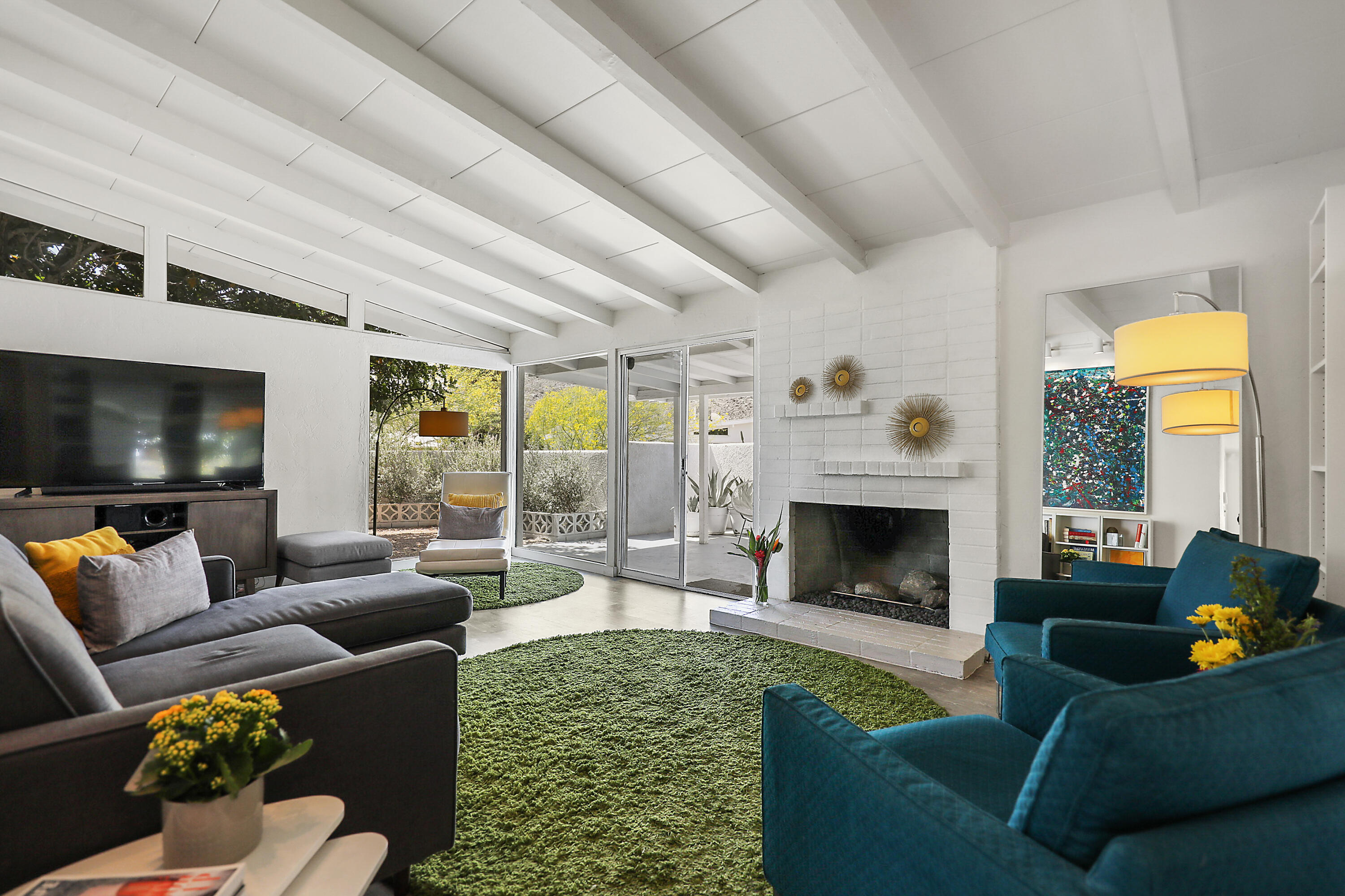 71767 Tunis Road Rancho Mirage, CA 92270 - Photo 8 of 30 a living room with furniture and a fireplace