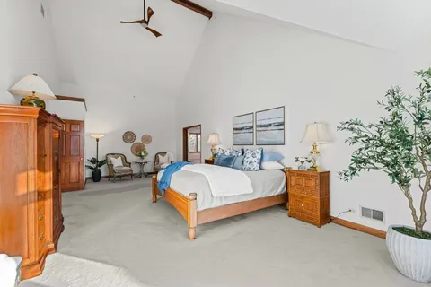 a room with gym equipment and a large window