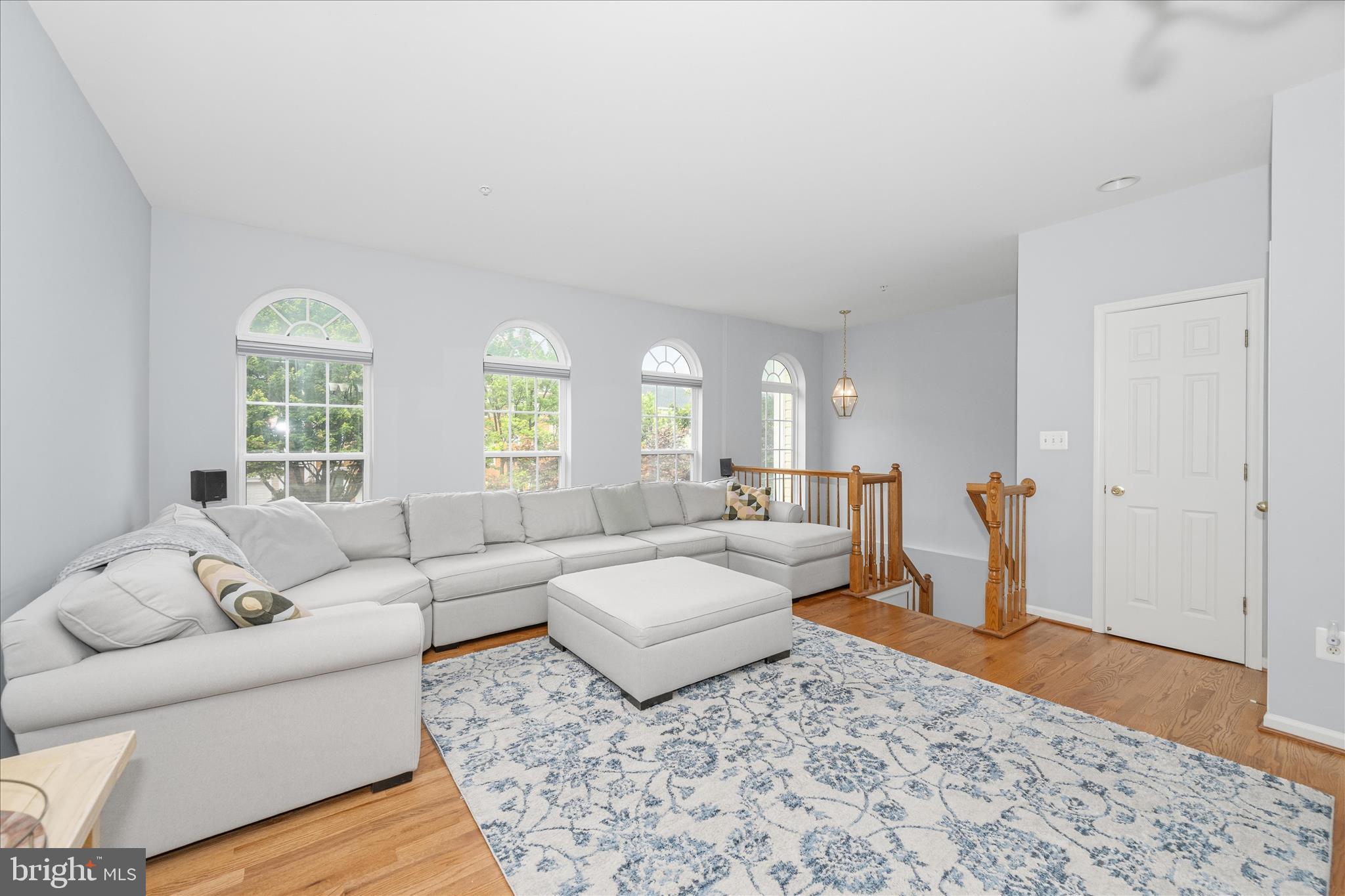 21 Inkberry Circle Gaithersburg, MD 20877 - Photo 6 of 51 a living room with furniture and a wooden floor