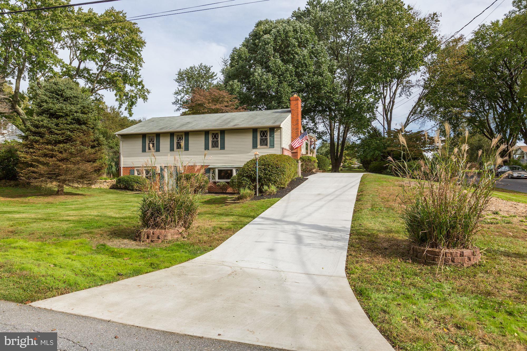 7833 Belgaro Road Laurel, MD 20723 - Photo 2 of 32 Newer concrete circular driveway