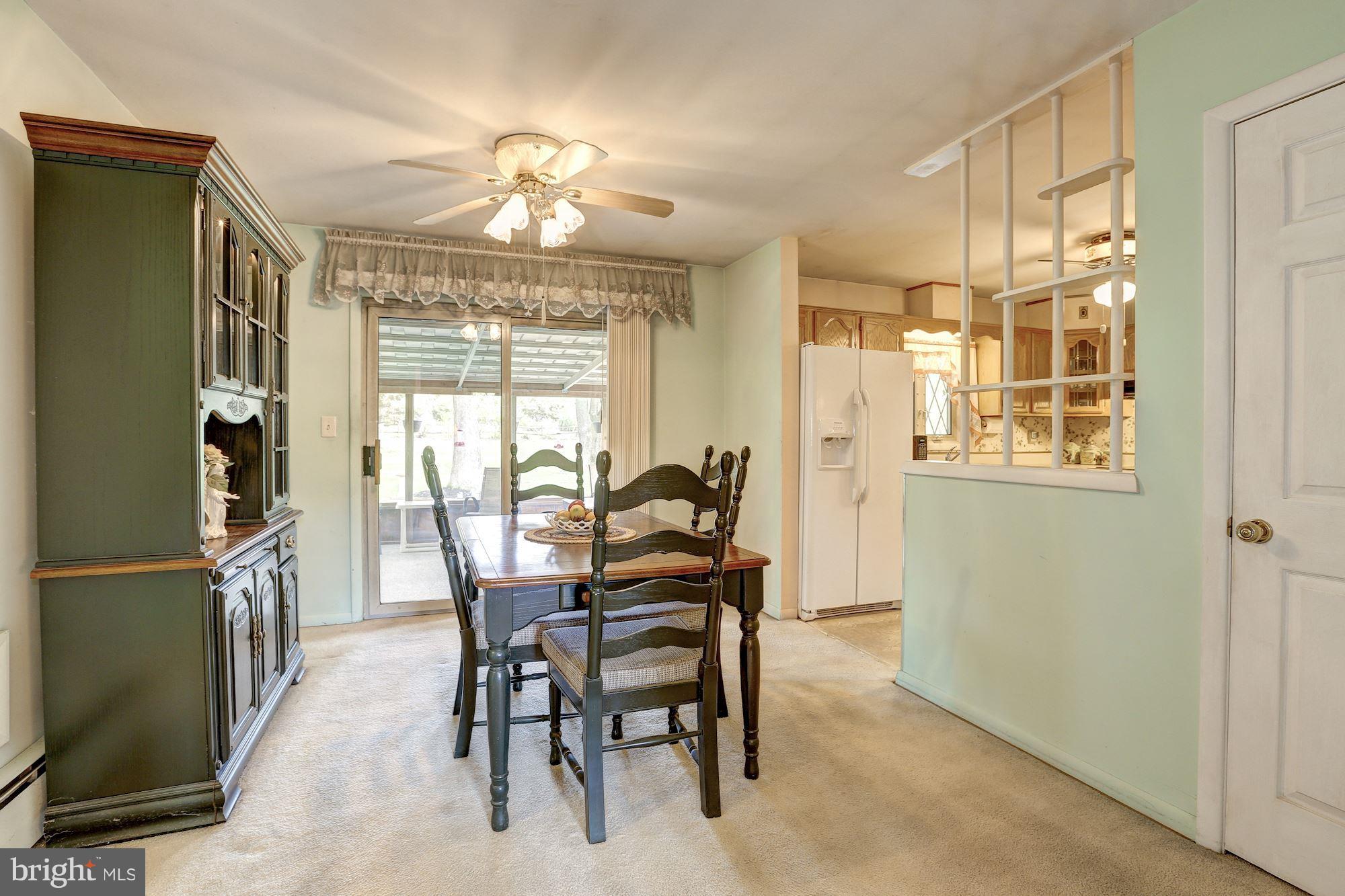 7833 Belgaro Road Laurel, MD 20723 - Photo 11 of 32 Formal dining room right off the kitchen
