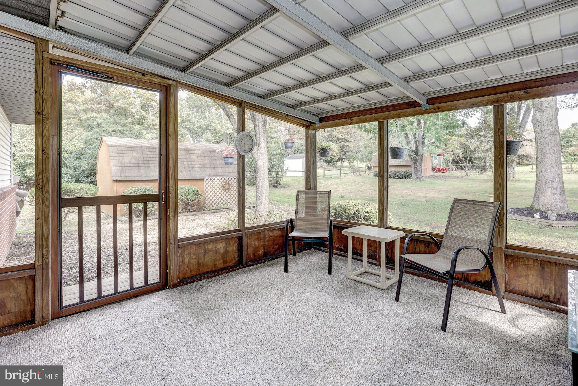 7833 Belgaro Road Laurel, MD 20723 - Photo 12 of 32 Screened in porch
