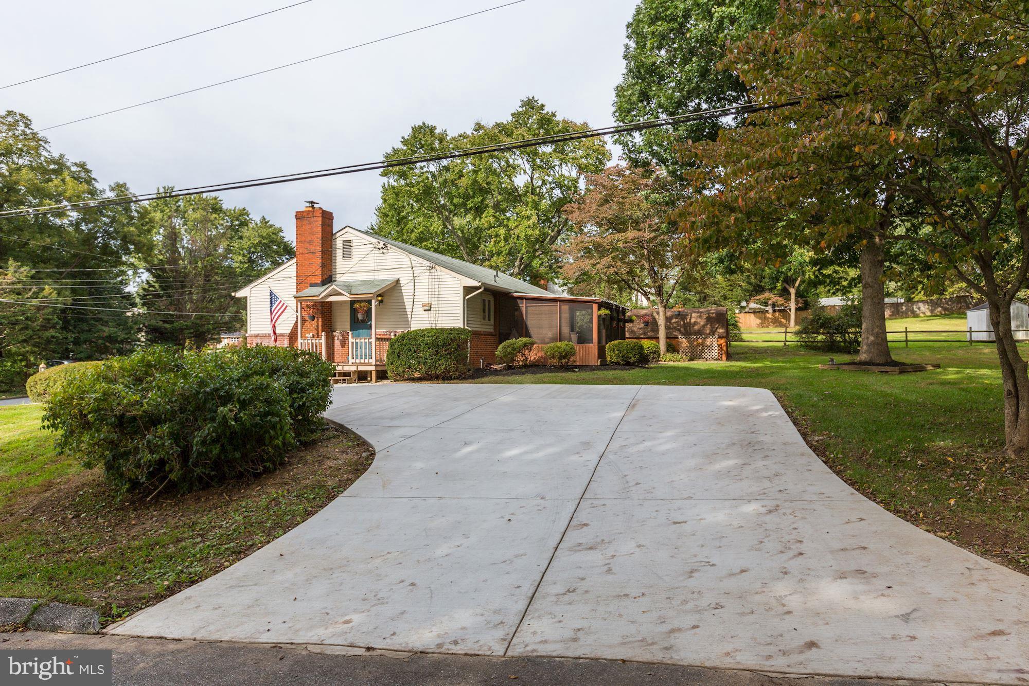 7833 Belgaro Road Laurel, MD 20723 - Photo 26 of 32 Large concrete parking pad/driveway