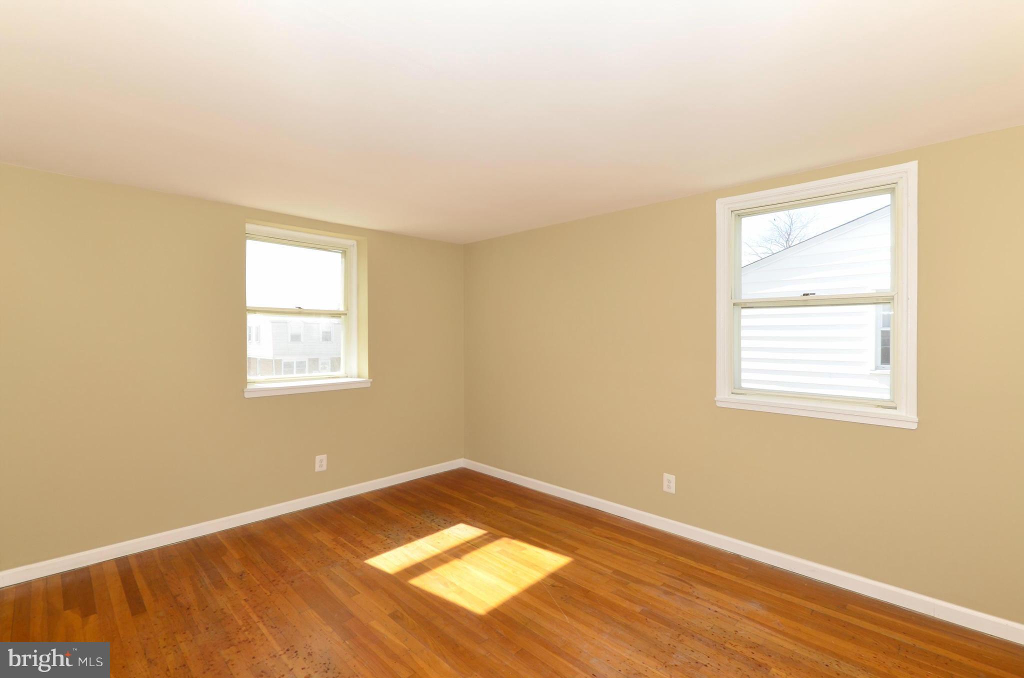 8058 Stratman Road Baltimore, MD 21222 - Photo 16 of 30 an empty room with a window
