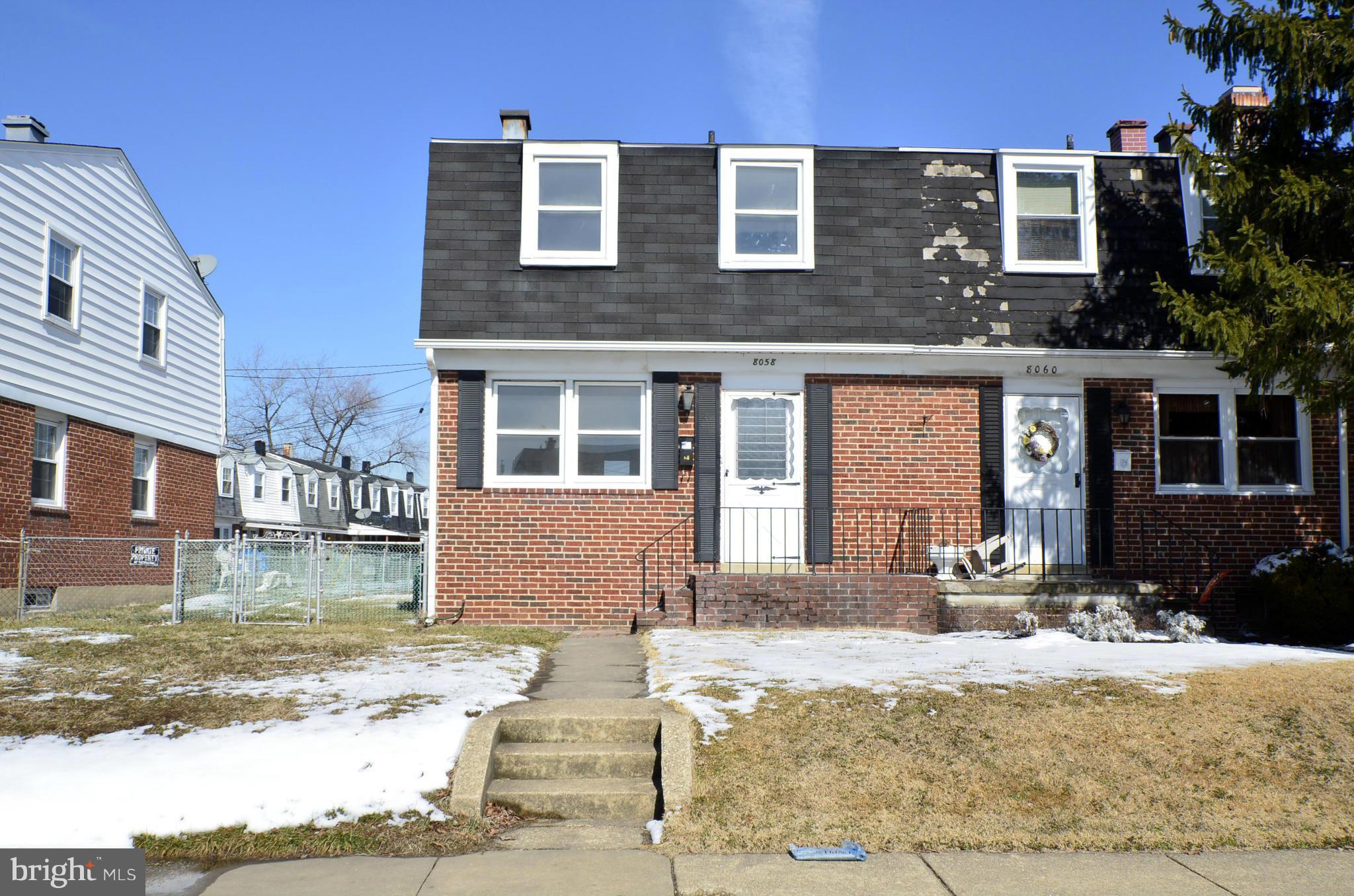 8058 Stratman Road Baltimore, MD 21222 - Photo 27 of 30 a front view of a house with a yard