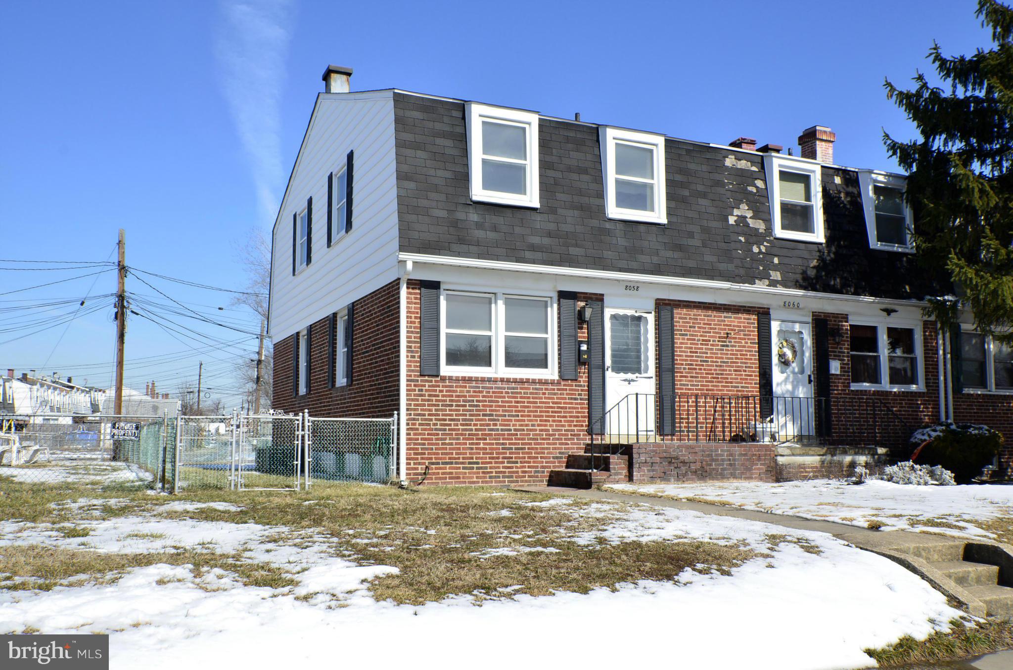 8058 Stratman Road Baltimore, MD 21222 - Photo 28 of 30 a front view of a house with a yard