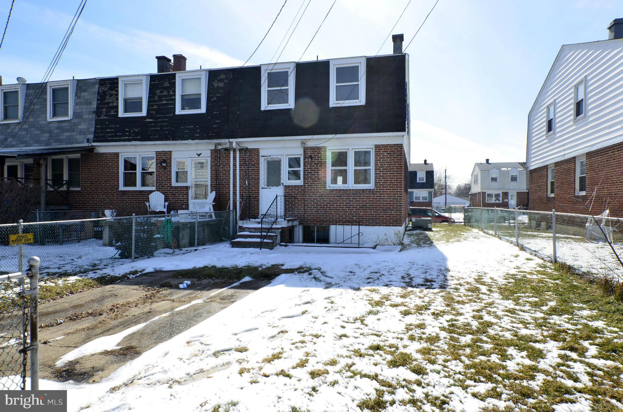 8058 Stratman Road Baltimore, MD 21222 - Photo 30 of 30 a view of a house with a yard