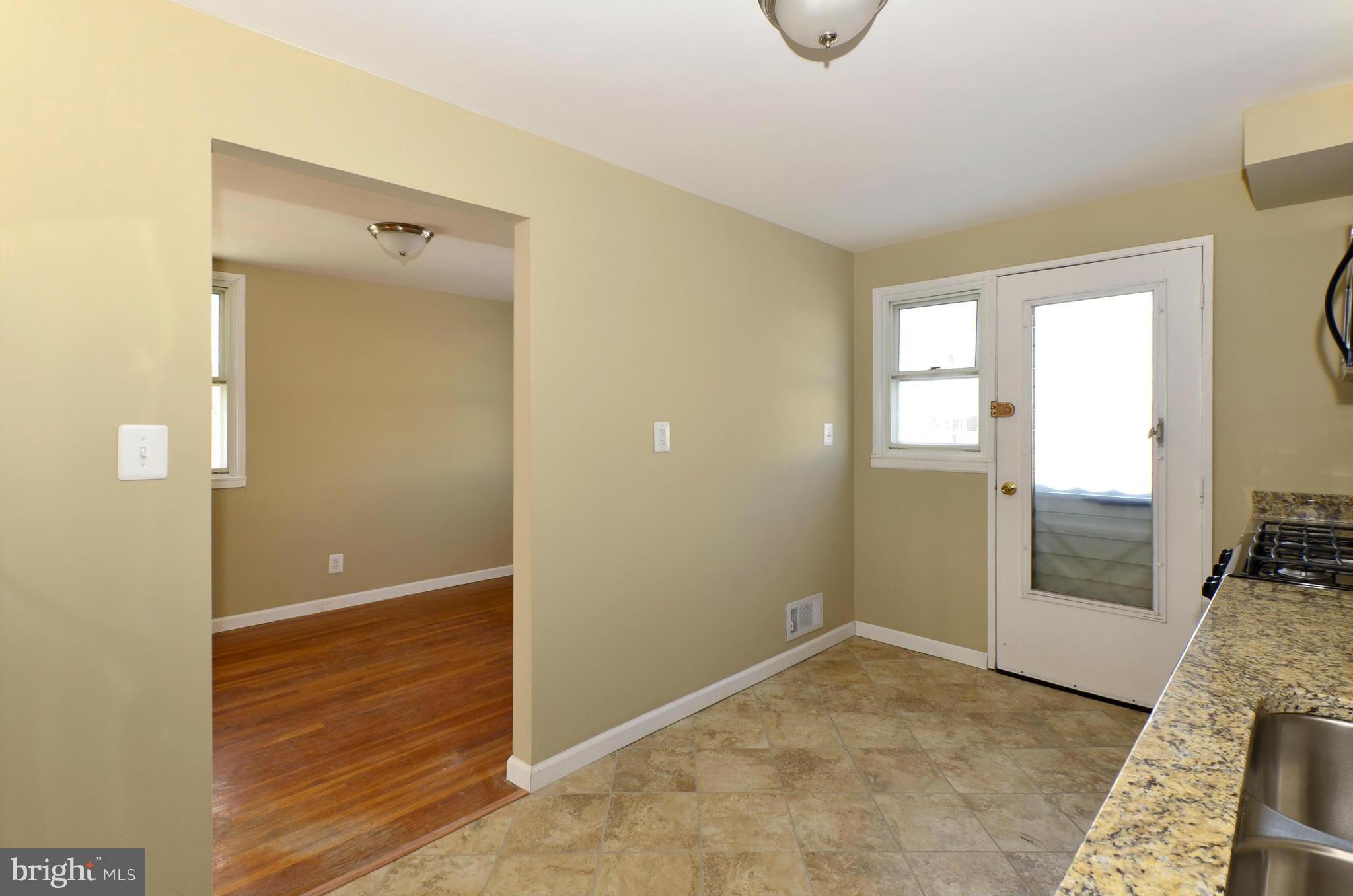 8058 Stratman Road Baltimore, MD 21222 - Photo 4 of 30 a view of livingroom with an empty space