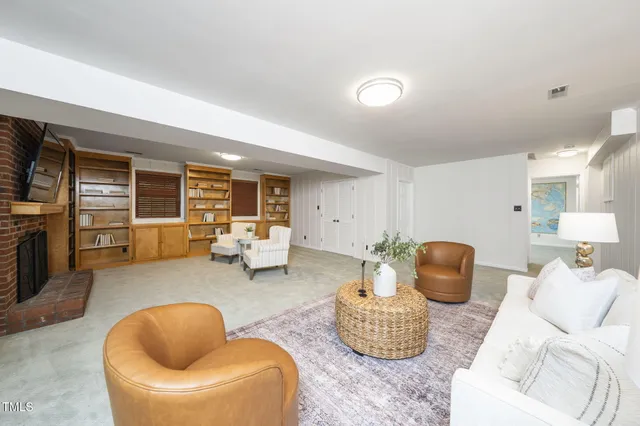 a living room with furniture and a couch