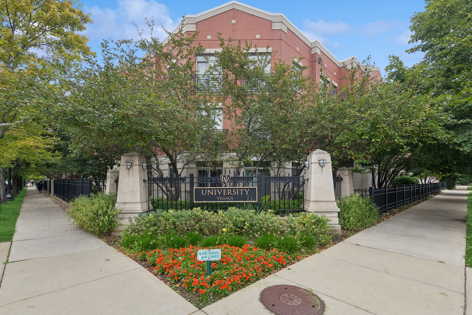 758 West 14th Place, Unit 1A Chicago, IL 60607 - Photo 1 of 1 a view of a multi story building with a yard