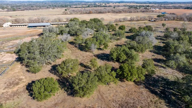 a view of a lake with beach and outdoor space