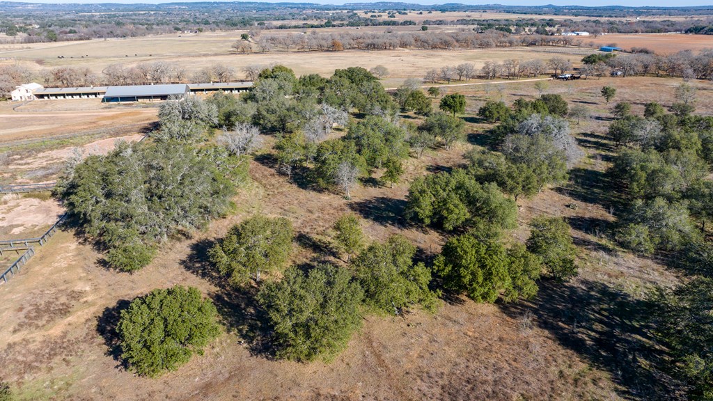 485 Fulton Ranch Road Stonewall, TX 78671 - Photo 4 of 22 a view of a lake with beach and outdoor space