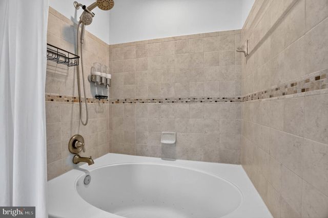 a bathroom with a bathtub