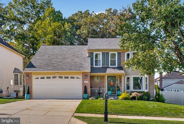 a front view of a building with garden