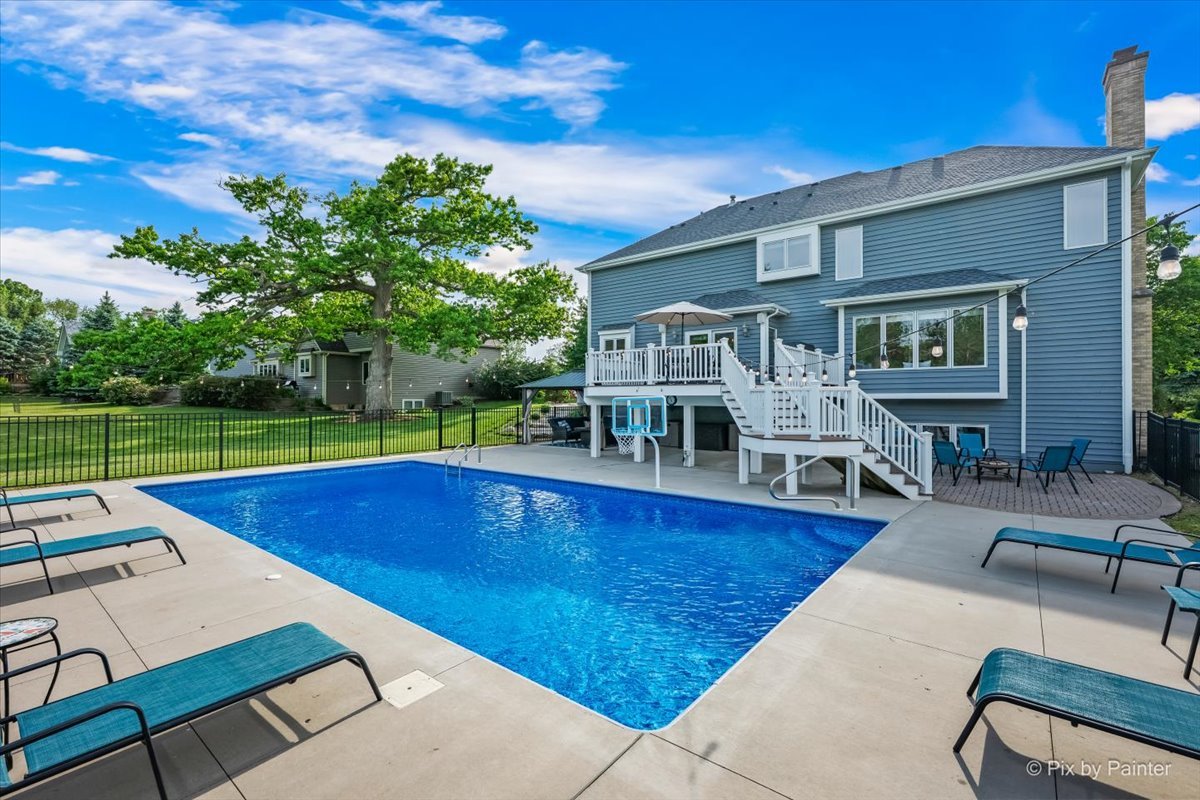 7104 Dove Way Cary, IL 60013 - Photo 64 of 82 a view of a house with swimming pool and sitting area