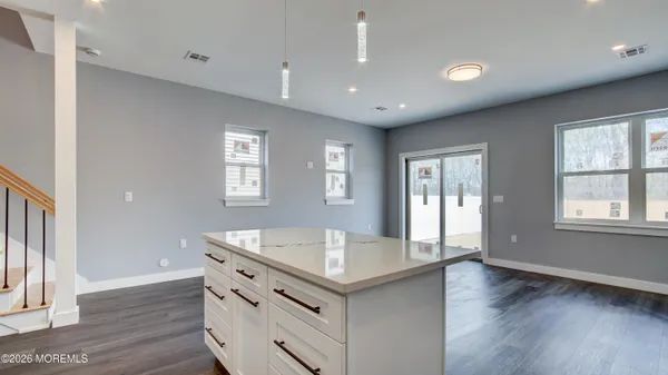 a view of kitchen and windows