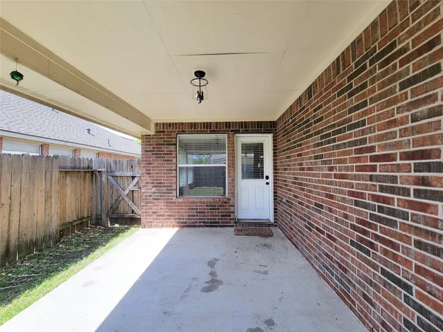 a view of house with stairs and wooden floor