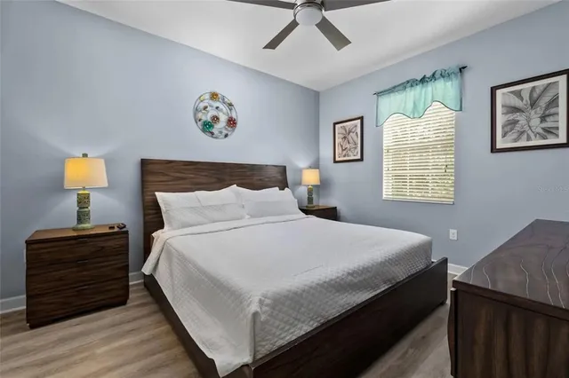 a bedroom with bed and window