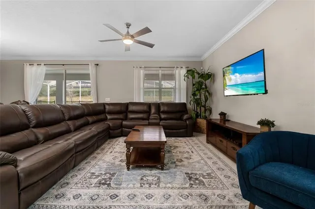 a living room with furniture and a rug