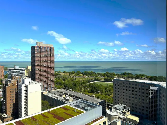 a view of a balcony with an ocean view