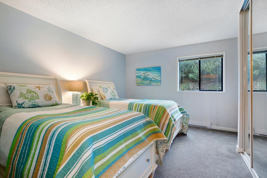 101 Shell Road, Unit 248 Watsonville, CA 95076 - Photo 19 of 28 a bedroom with a bed and window