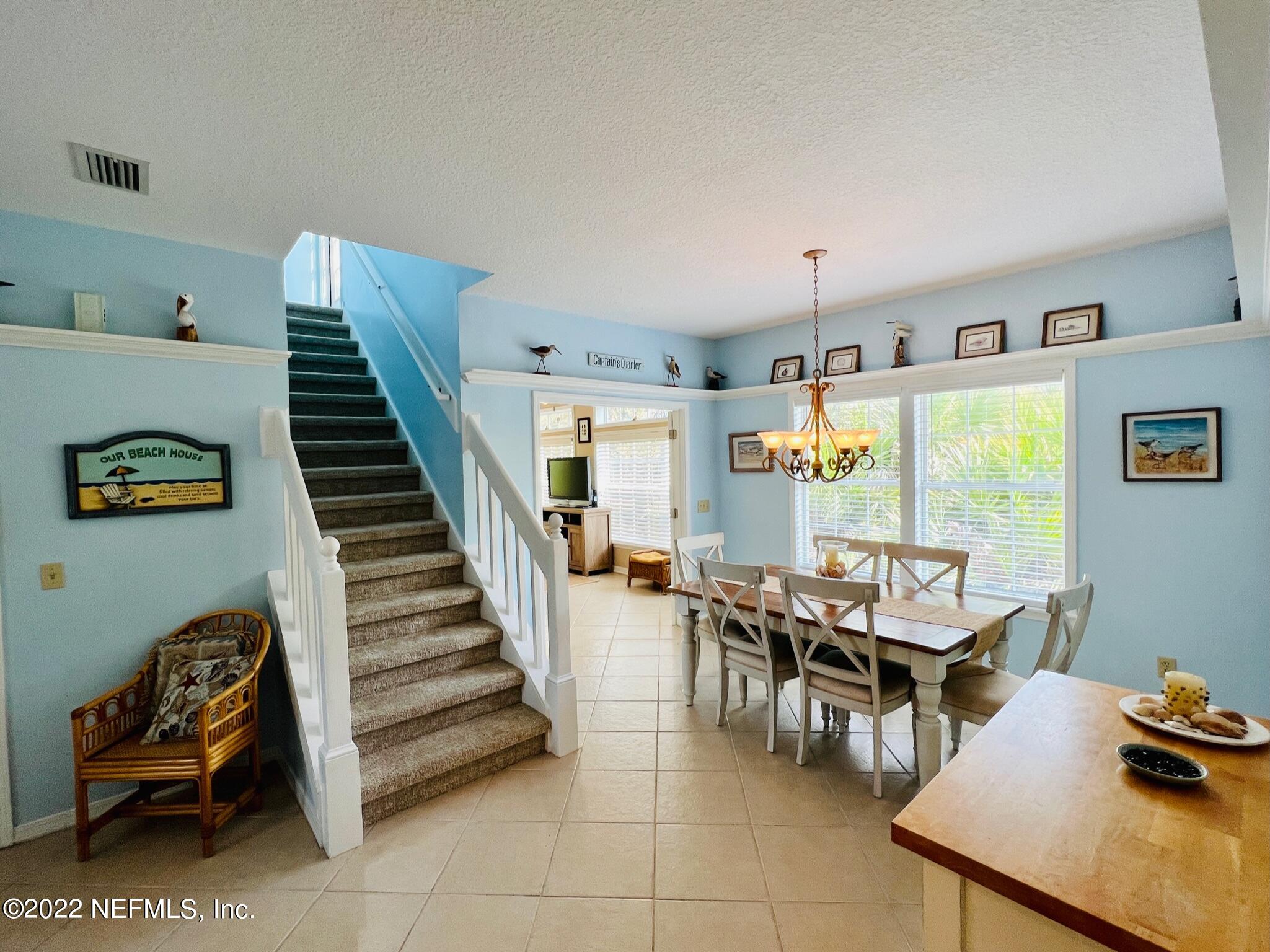 212 Gull Circle Ponte Vedra Beach, FL 32082 - Photo 12 of 49 a dining room with furniture and a window