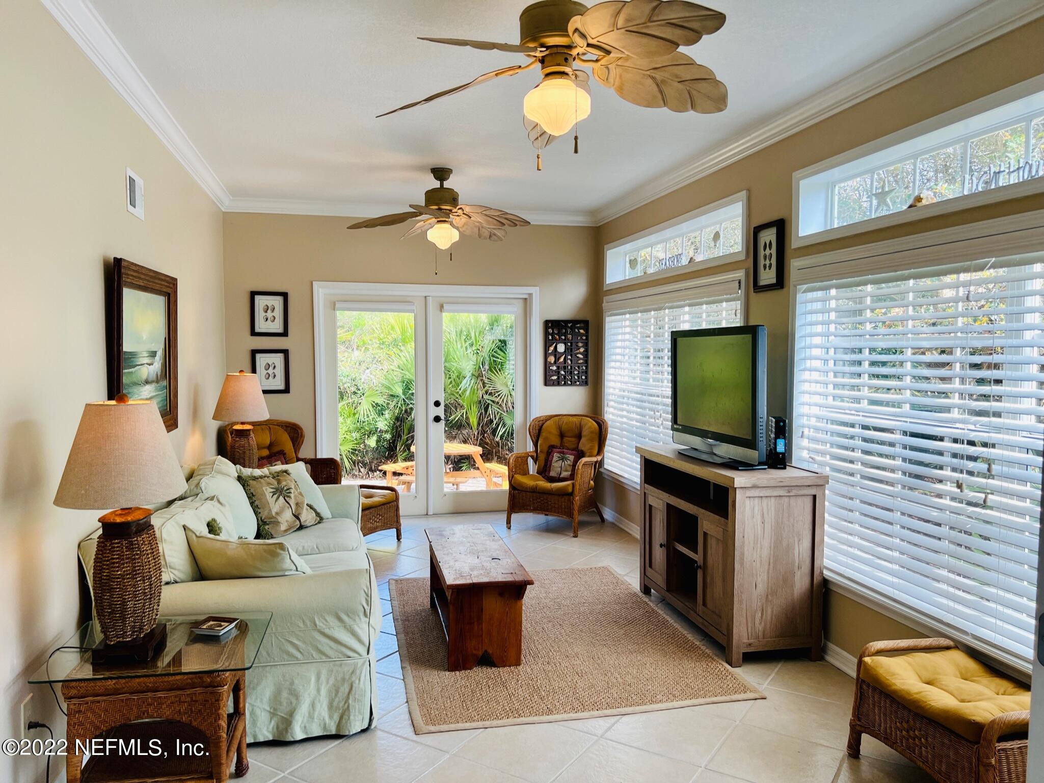 212 Gull Circle Ponte Vedra Beach, FL 32082 - Photo 16 of 49 a living room with furniture and a flat screen tv