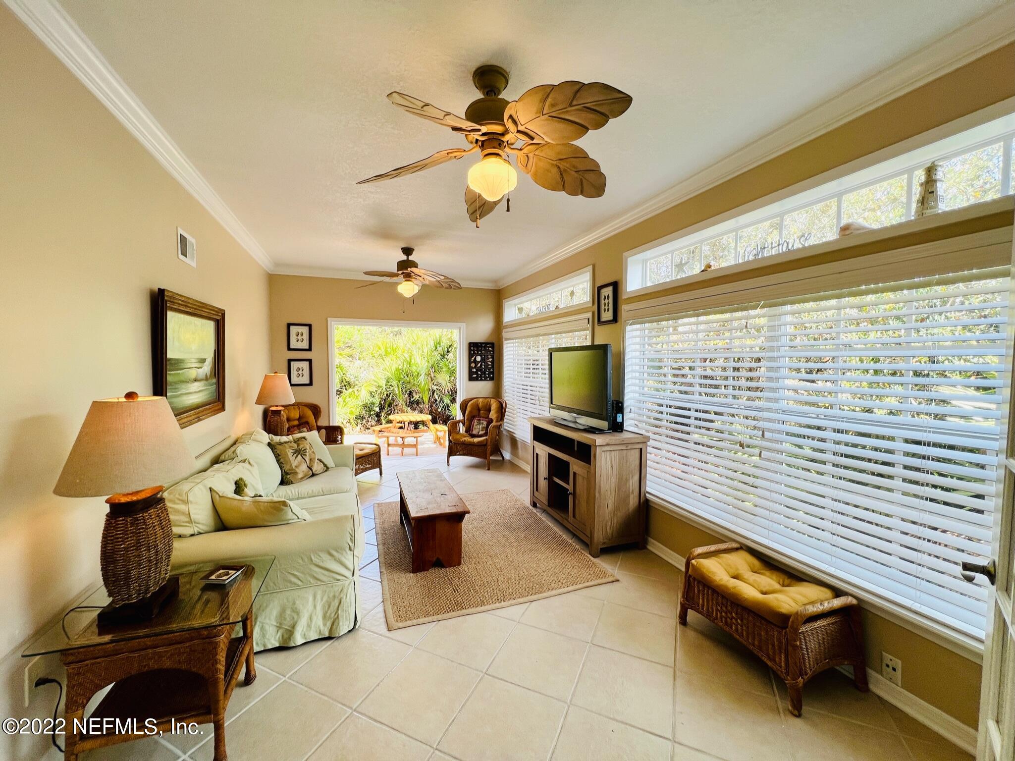 212 Gull Circle Ponte Vedra Beach, FL 32082 - Photo 17 of 49 a living room with furniture and a flat screen tv